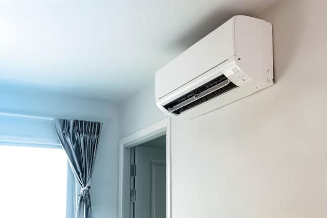 Air Conditioner Mounted On The Wall — Laguna Electrical Services in Nambour, QLD
